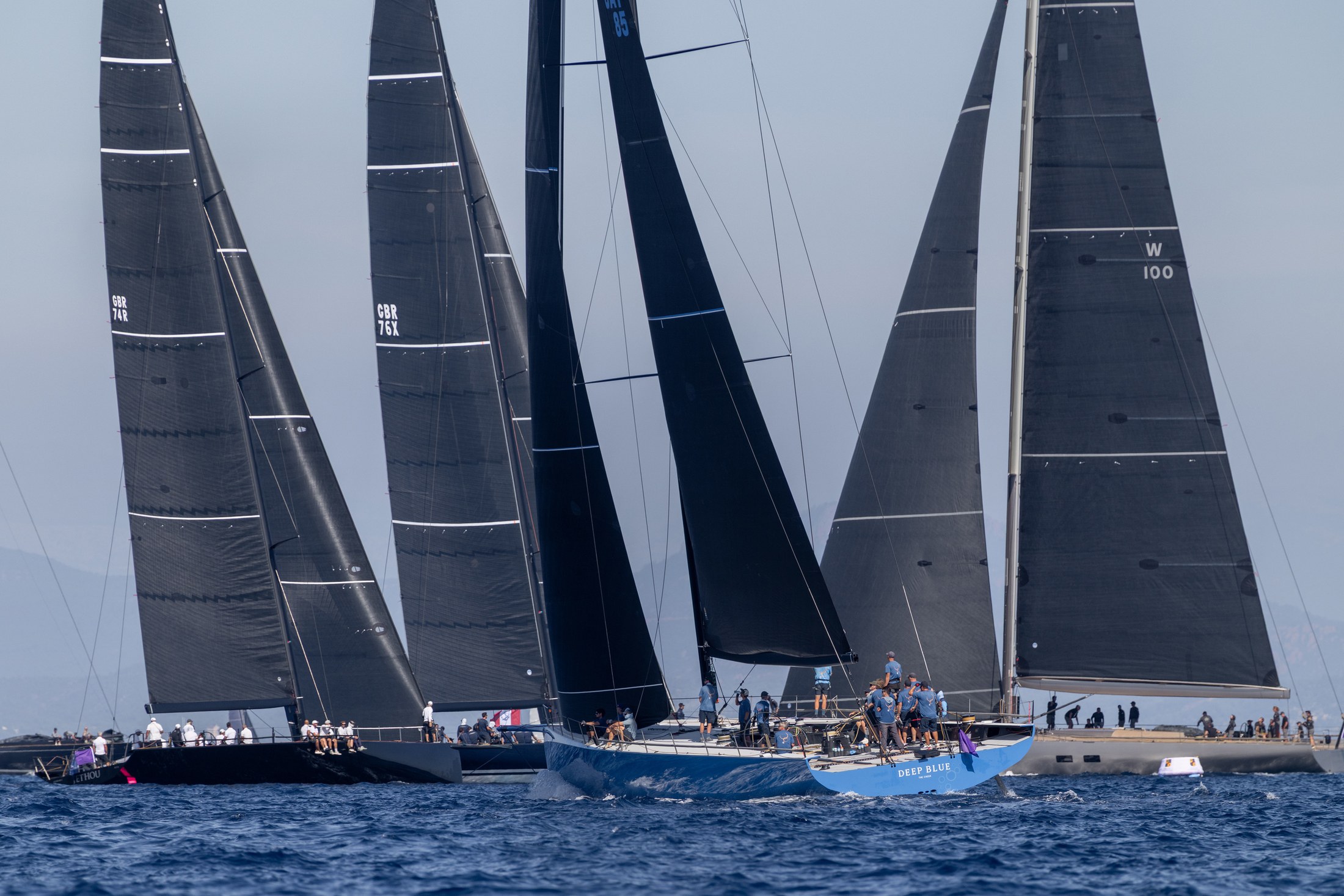 Opening-day winner Jethou at left, with Deep Blue leading the Maxi 100 contingent. Photo: Gilles Martin-Raget / www.martin-raget.com
